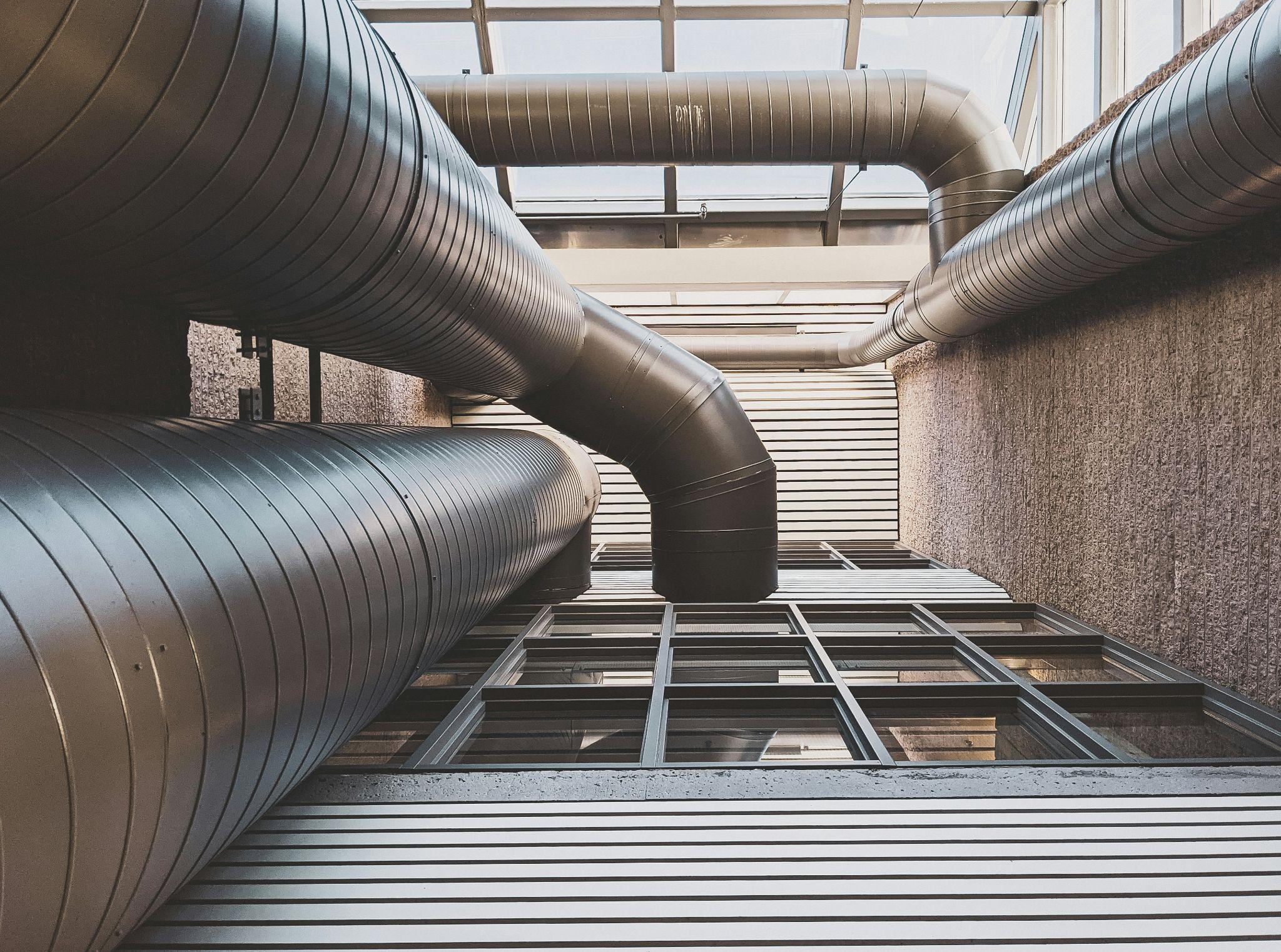 Large ventilation ducts illustrate the heating infrastructure involved in furnace installations in Fresno.